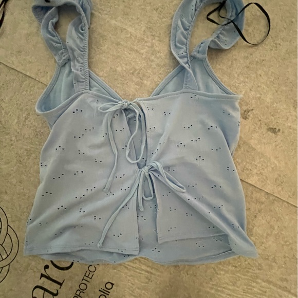 Very cute light blue summer tank. Ties in back. - Picture 2 of 2